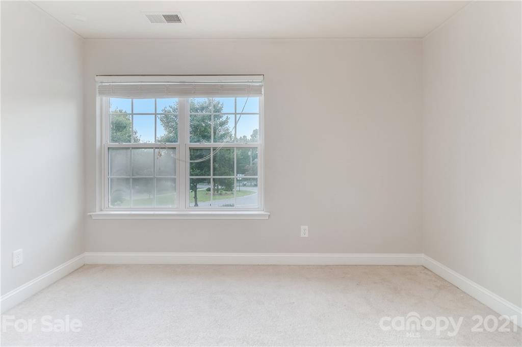 101 Old Meadowbrook Road Mooresville, NC 28115 - Photo 15 of 18 an empty room with a window