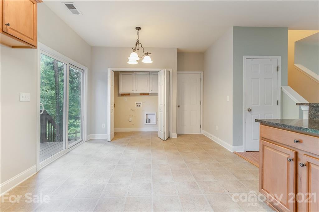 101 Old Meadowbrook Road Mooresville, NC 28115 - Photo 7 of 18 a view of a livingroom with a chandelier