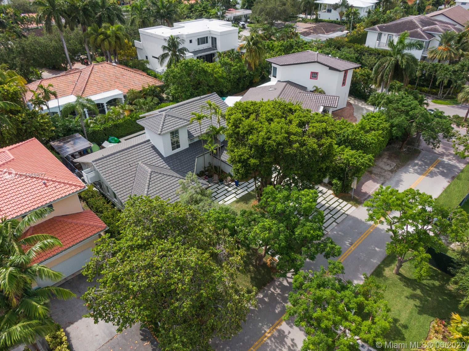 677 Ridgewood Road Key Biscayne, FL 33149 - Photo 33 of 38 an aerial view of a houses with greenery space