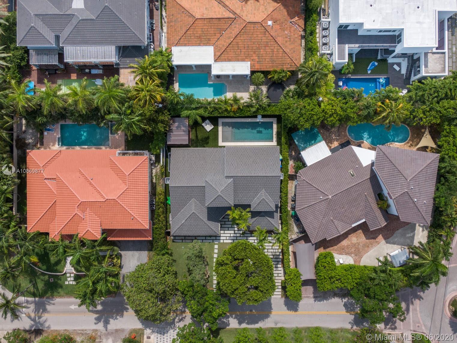 677 Ridgewood Road Key Biscayne, FL 33149 - Photo 38 of 38 an aerial view of house with yard