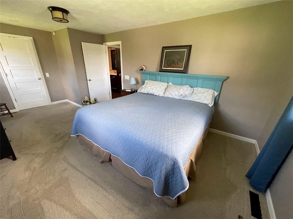 184 Sprowls Road Bentleyville, PA 15314 - Photo 19 of 25 a bedroom with a bed and a dresser