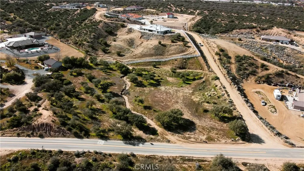 0 Coleridge Road Oak Hills, CA 92344 - Photo 19 of 22 a view of a yard with wooden fence