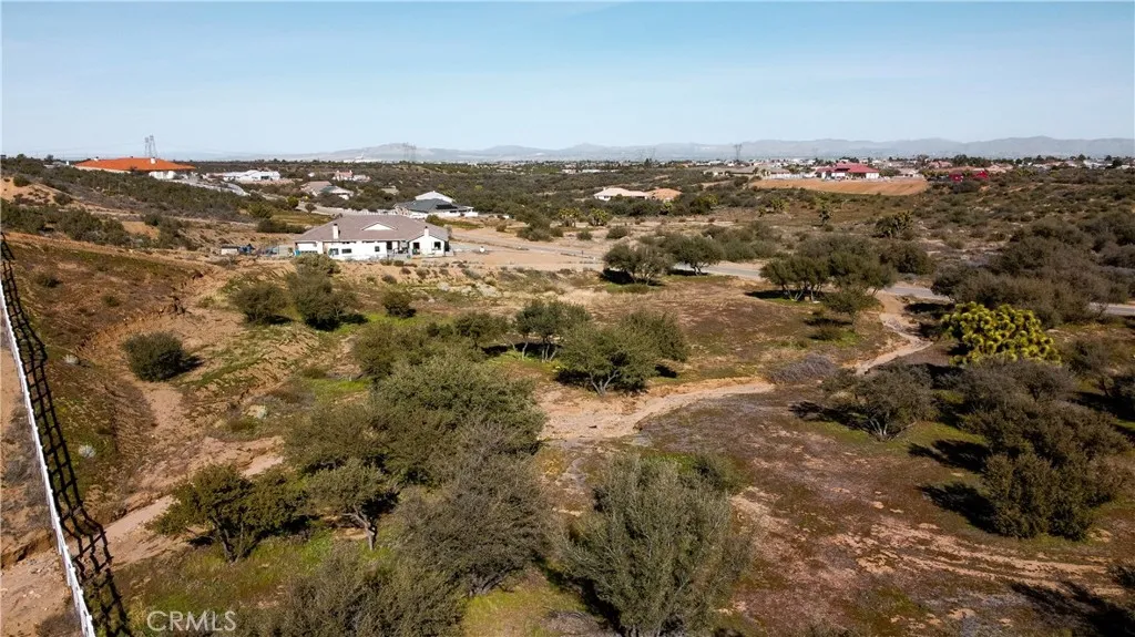 0 Coleridge Road Oak Hills, CA 92344 - Photo 3 of 22 an aerial view of house with yard and mountain view in back