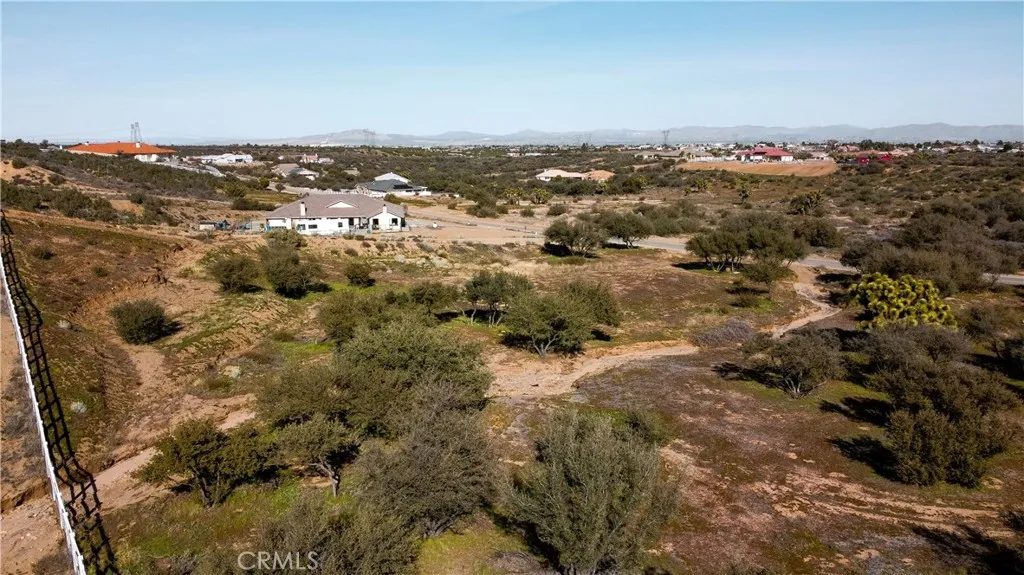 0 Coleridge Road Oak Hills, CA 92344 - Photo 3 of 22 an aerial view of residential house and lake view
