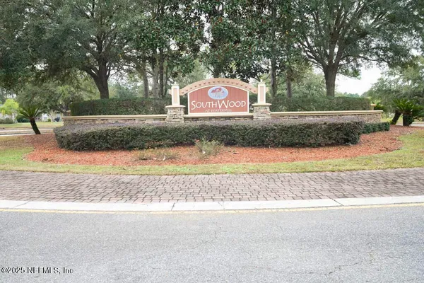 a sign that is on the side of a road