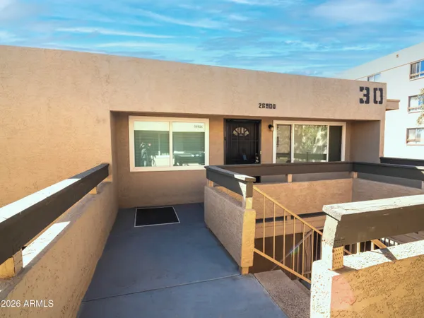 a view of a living room with a window