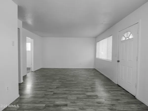 a view of an empty room and window