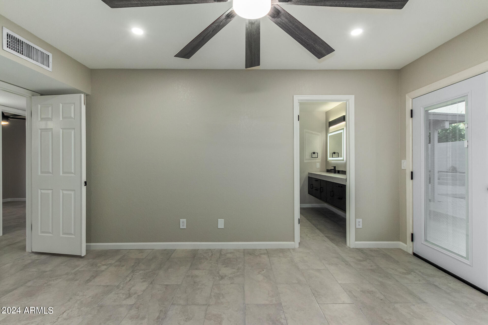1734 West Banff Ln. Phoenix, AZ 85023 - Photo 16 of 44 an empty room with closet