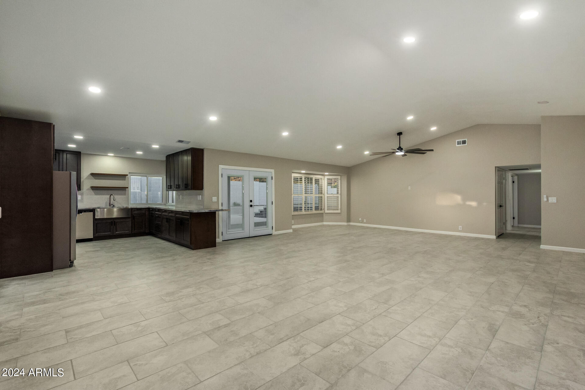 1734 West Banff Ln. Phoenix, AZ 85023 - Photo 6 of 44 a view of kitchen with kitchen island and stainless steel appliances