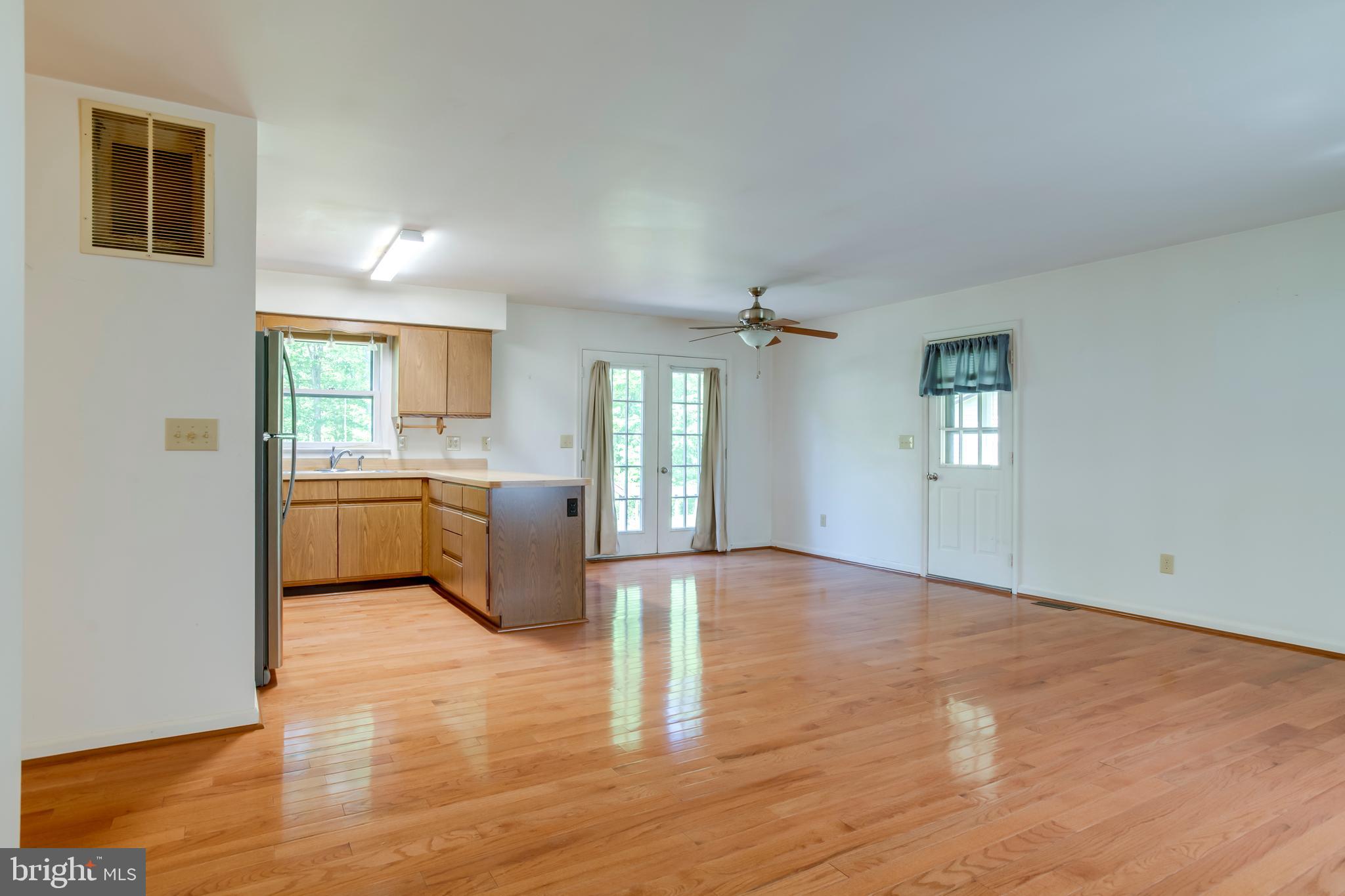 803 Weaver Hollow Road Banco, VA 22711 - Photo 2 of 67 a view of a kitchen with a sink dishwasher and a microwave