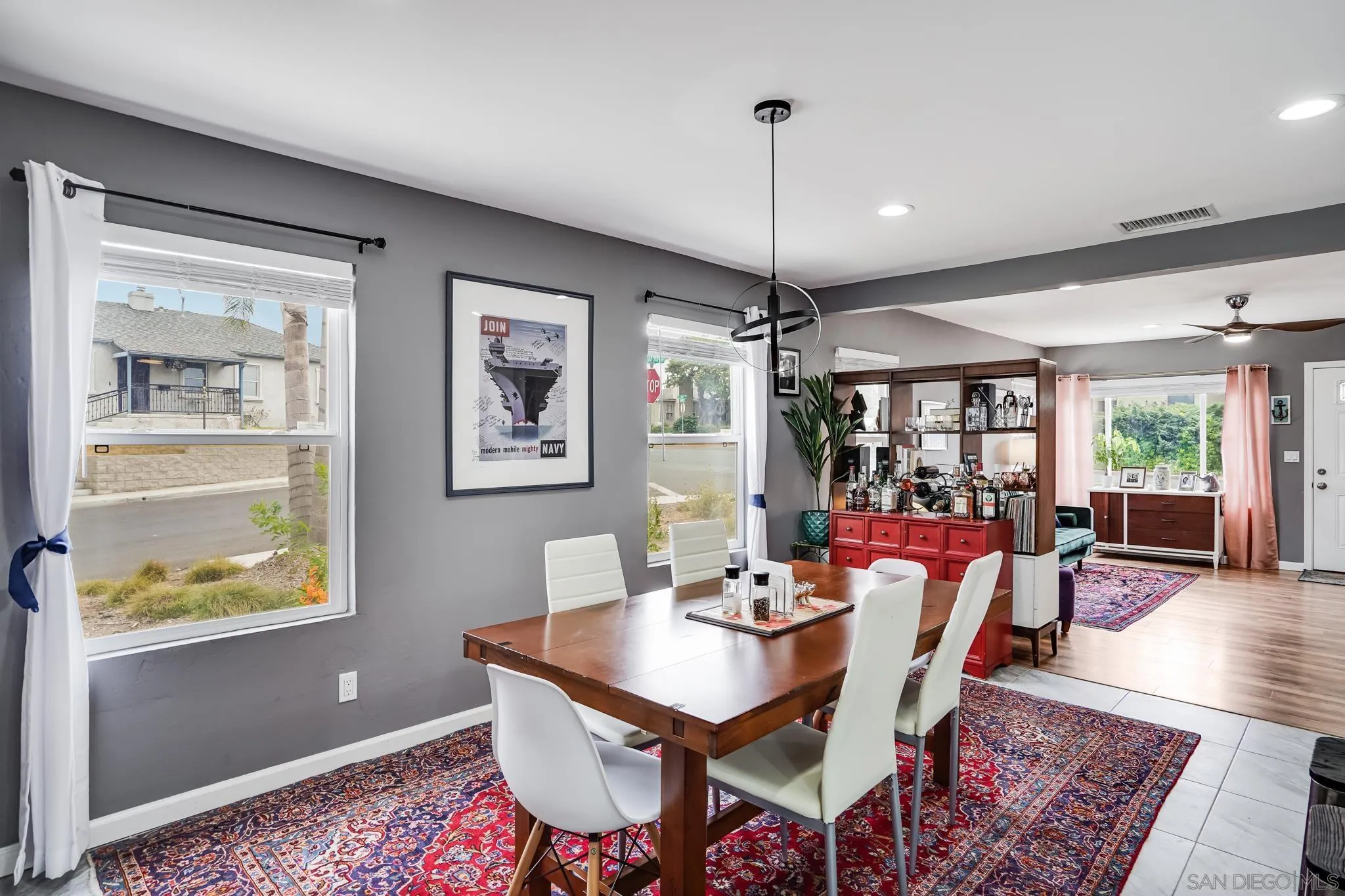 7690 Canton Drive Lemon Grove, CA 91945 - Photo 16 of 41 a view of a dining room with furniture window and wooden floor