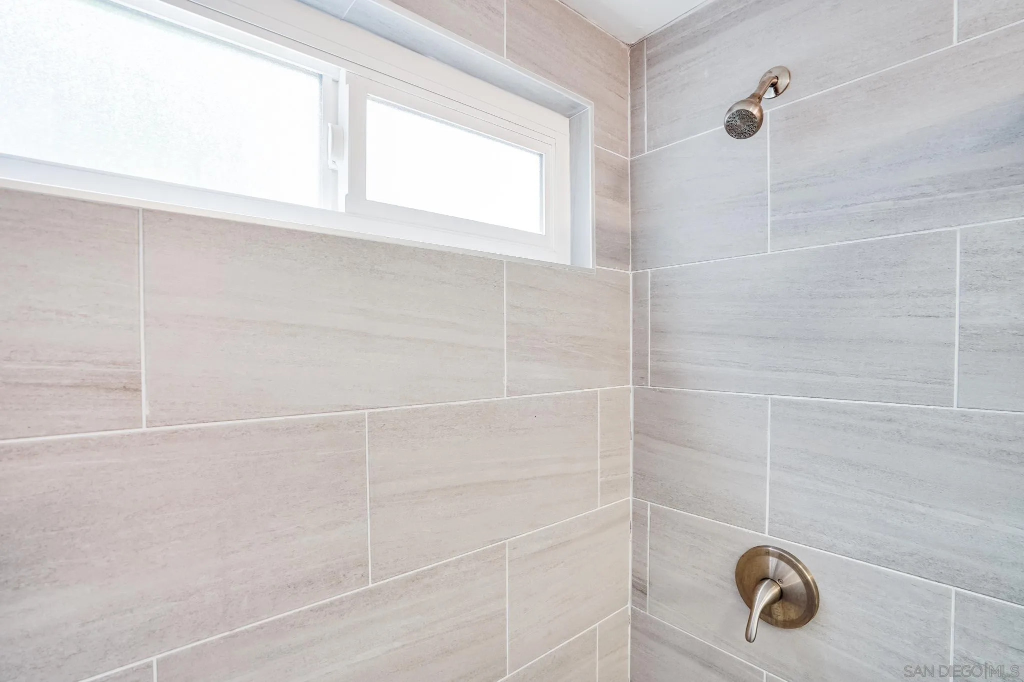 7690 Canton Drive Lemon Grove, CA 91945 - Photo 26 of 41 a bathroom with a shower