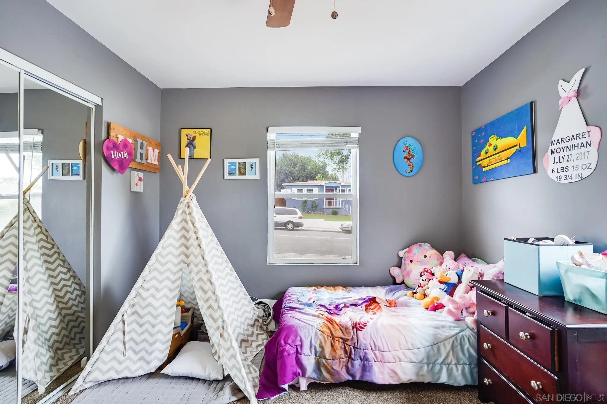 7690 Canton Drive Lemon Grove, CA 91945 - Photo 28 of 41 a bedroom with a bed and window