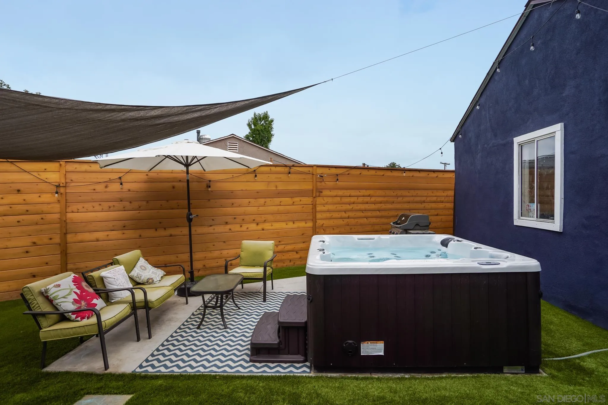 7690 Canton Drive Lemon Grove, CA 91945 - Photo 35 of 41 a terrace of a house with outdoor seating