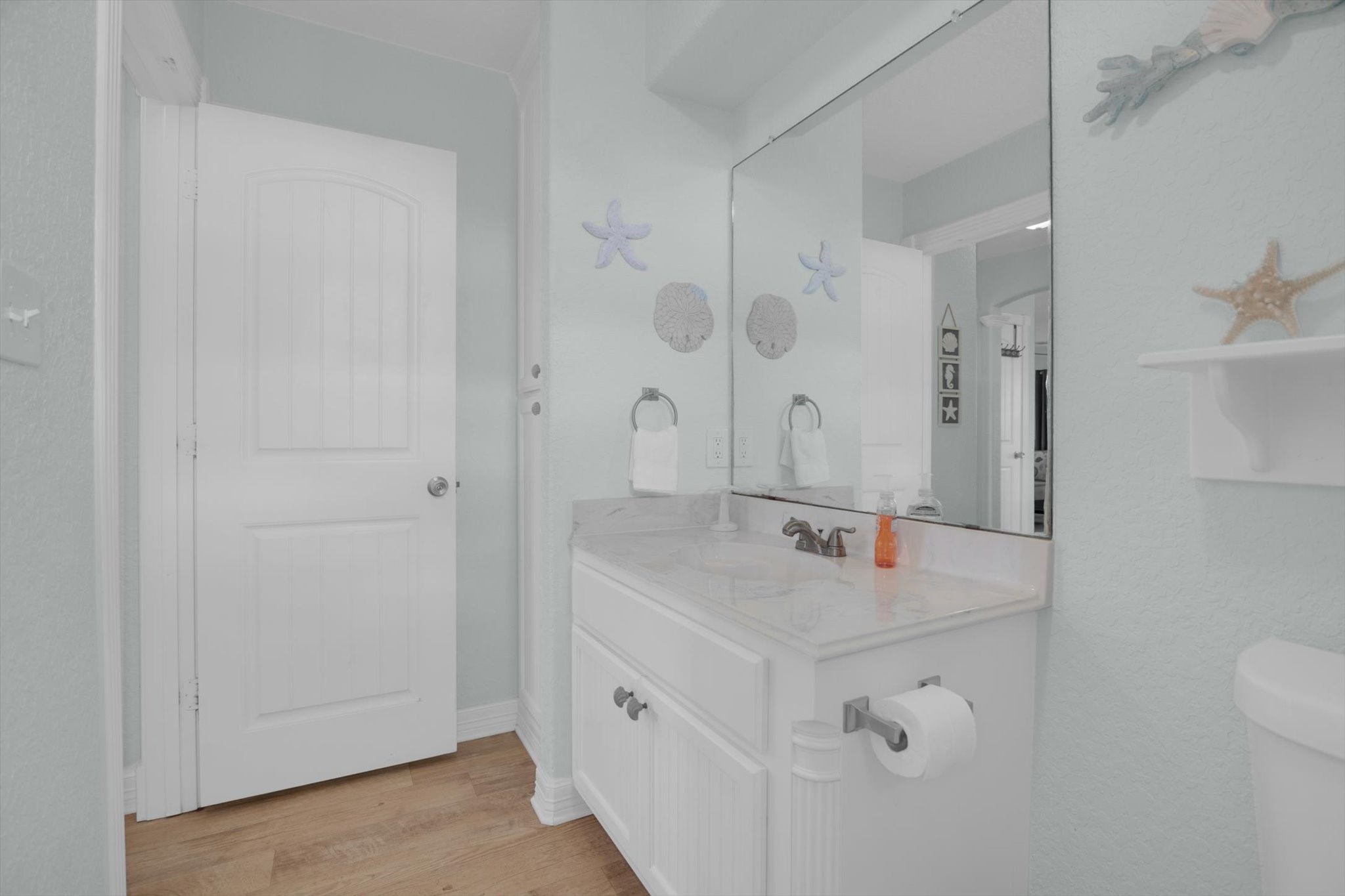 422 Jettyview Road Freeport, TX 77541 - Photo 12 of 37 a bathroom with a sink double vanity and a mirror
