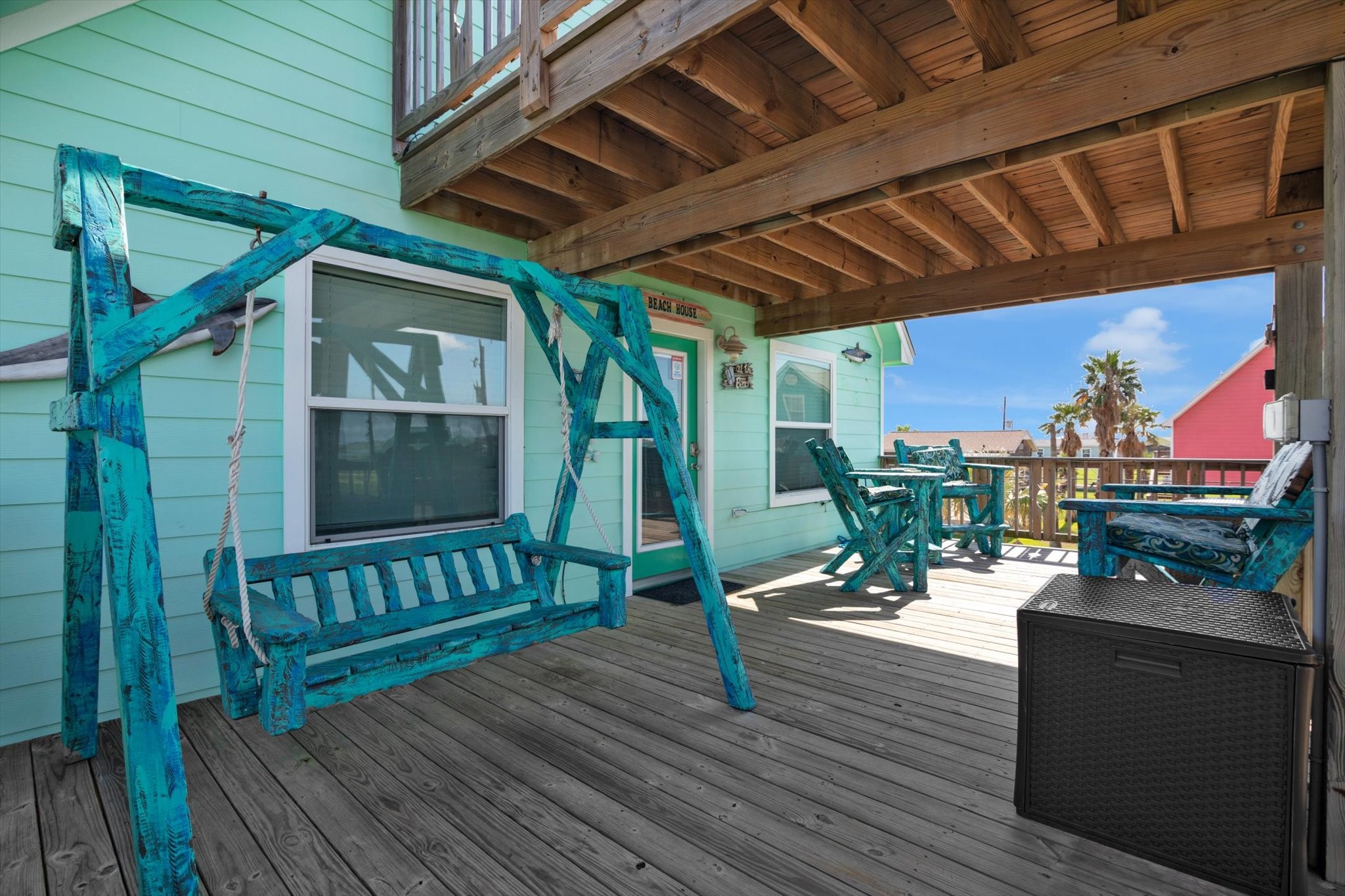 422 Jettyview Road Freeport, TX 77541 - Photo 19 of 37 a view of a chairs in wooden deck