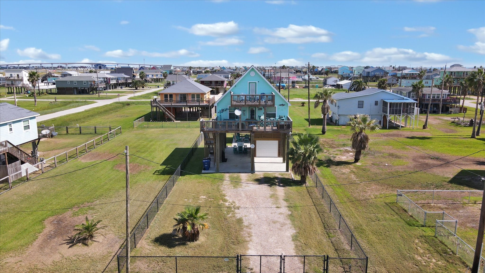 422 Jettyview Road Freeport, TX 77541 - Photo 2 of 37 a view of a city with lawn chairs