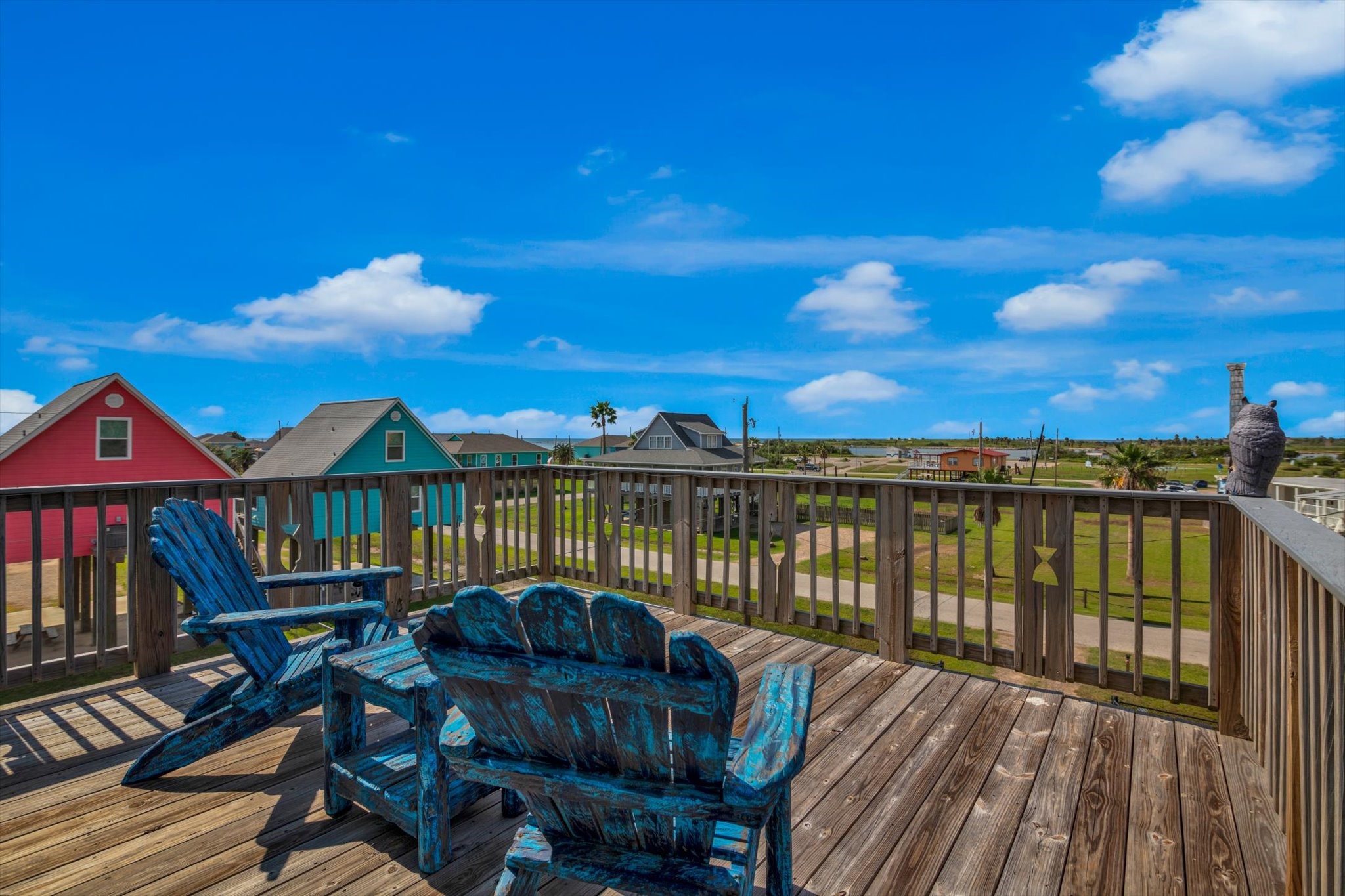422 Jettyview Road Freeport, TX 77541 - Photo 22 of 37 a view of a balcony with two chairs and a table