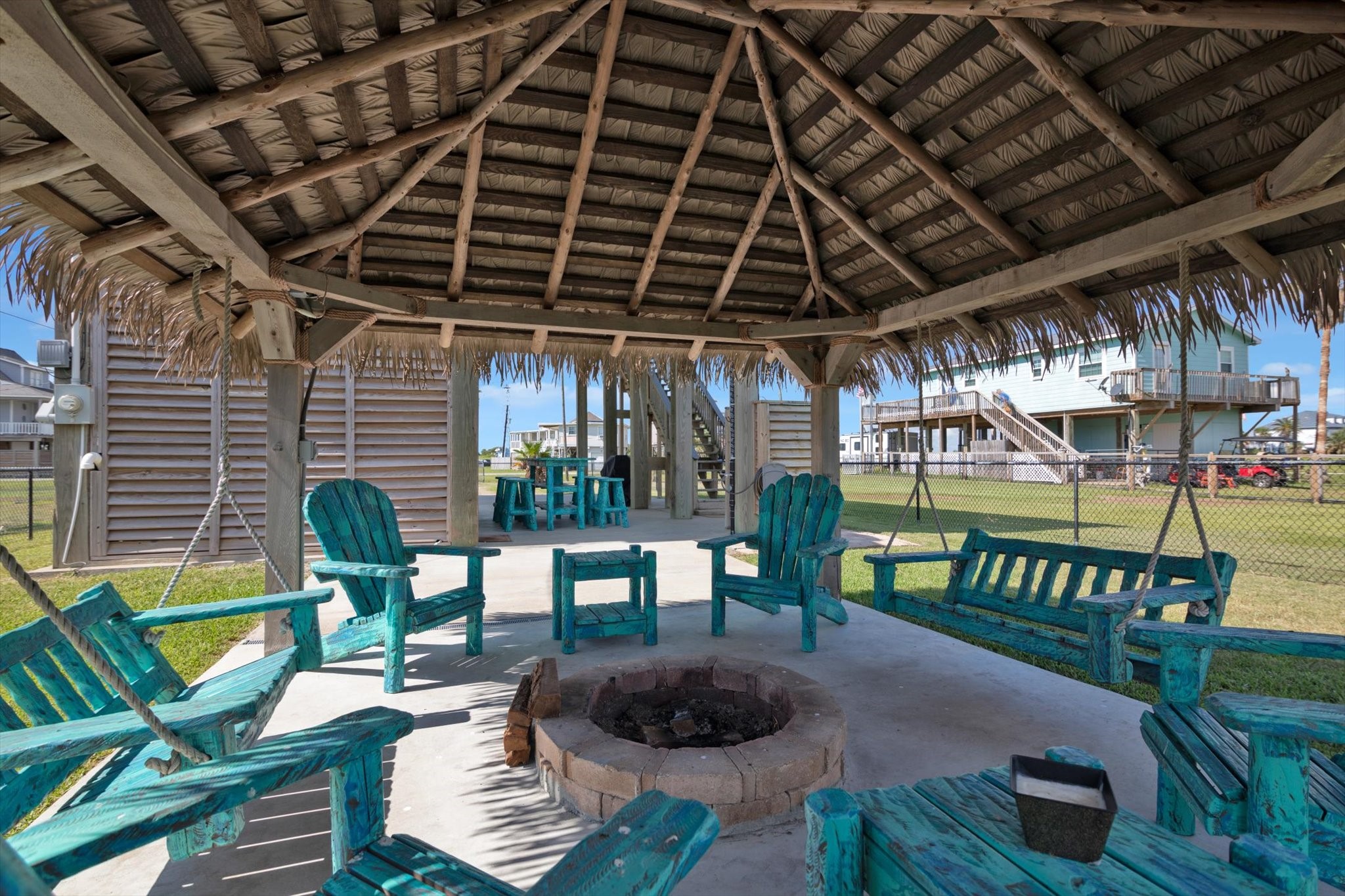 422 Jettyview Road Freeport, TX 77541 - Photo 28 of 37 a view of a porch with furniture and a yard