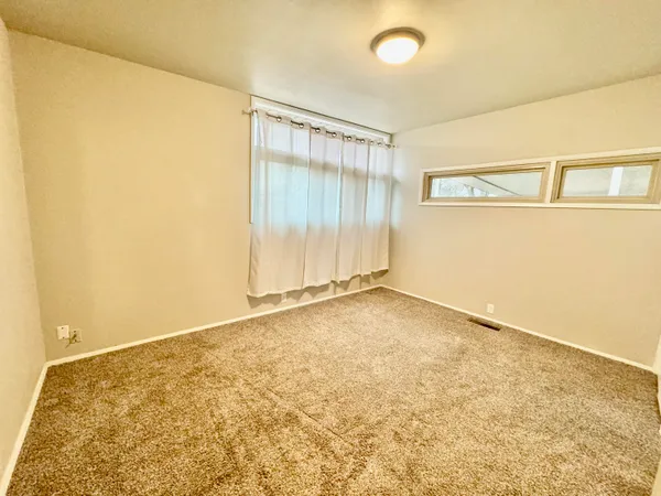 an empty room with a natural light