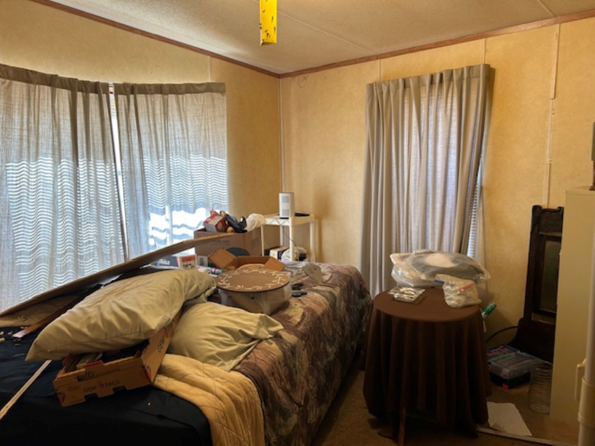 30996 Strathmore Road Waller, TX 77484 - Photo 14 of 20 a bed sitting in a bedroom next to a window