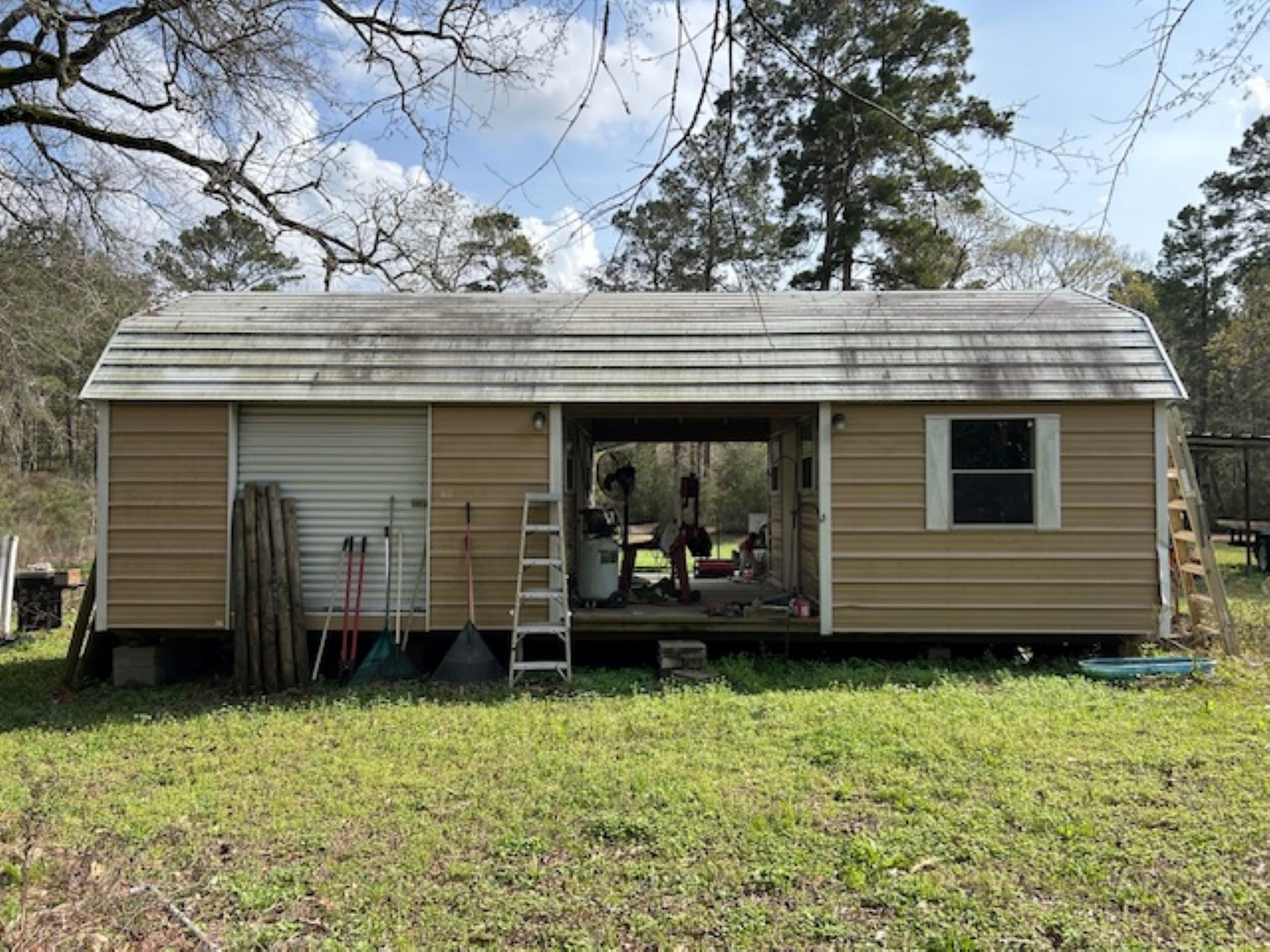 30996 Strathmore Road Waller, TX 77484 - Photo 8 of 20 a front view of a house with garden
