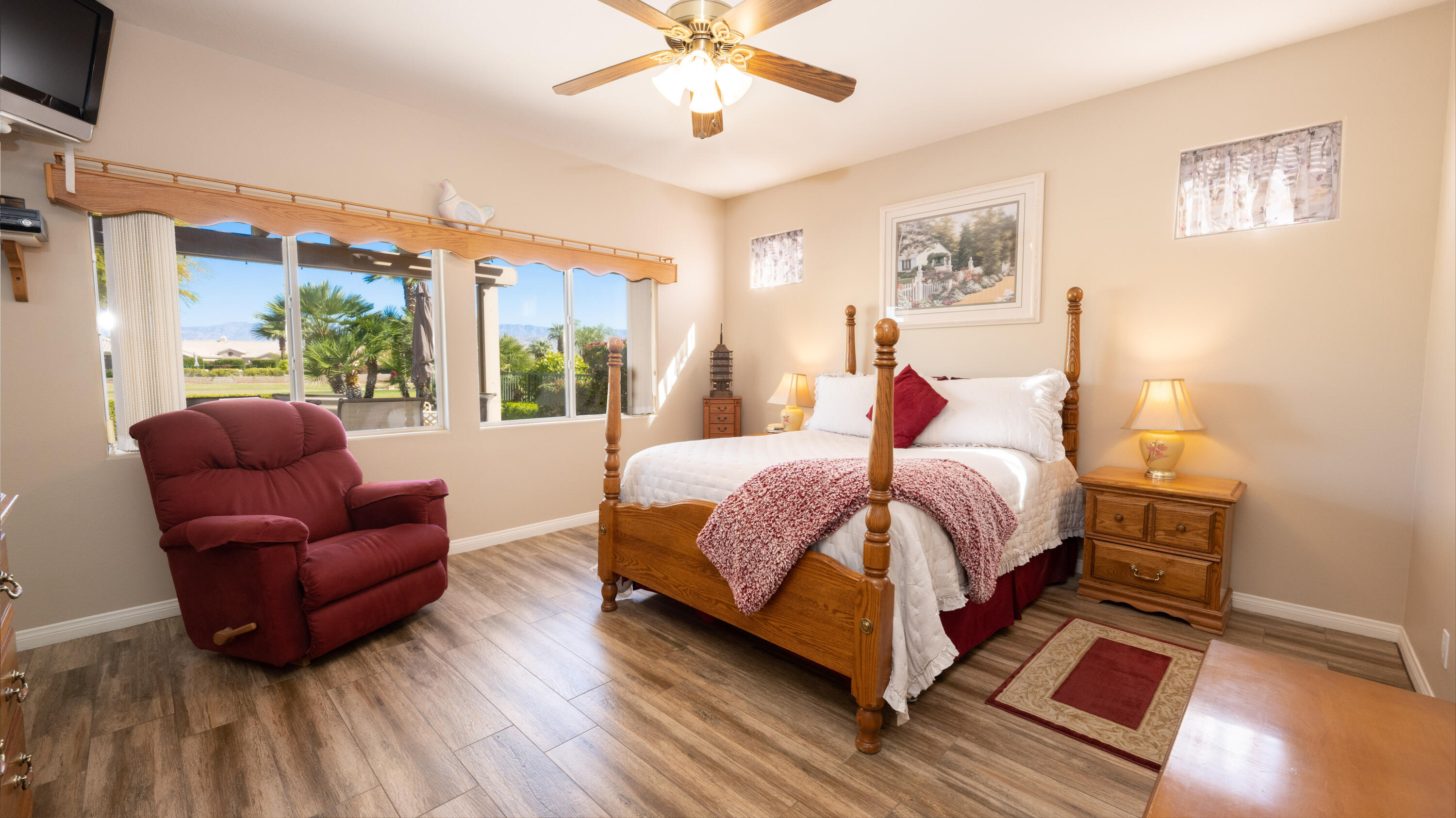 80432 Pebble Beach Drive Indio, CA 92201 - Photo 16 of 46 a spacious bedroom with a bed and a couch