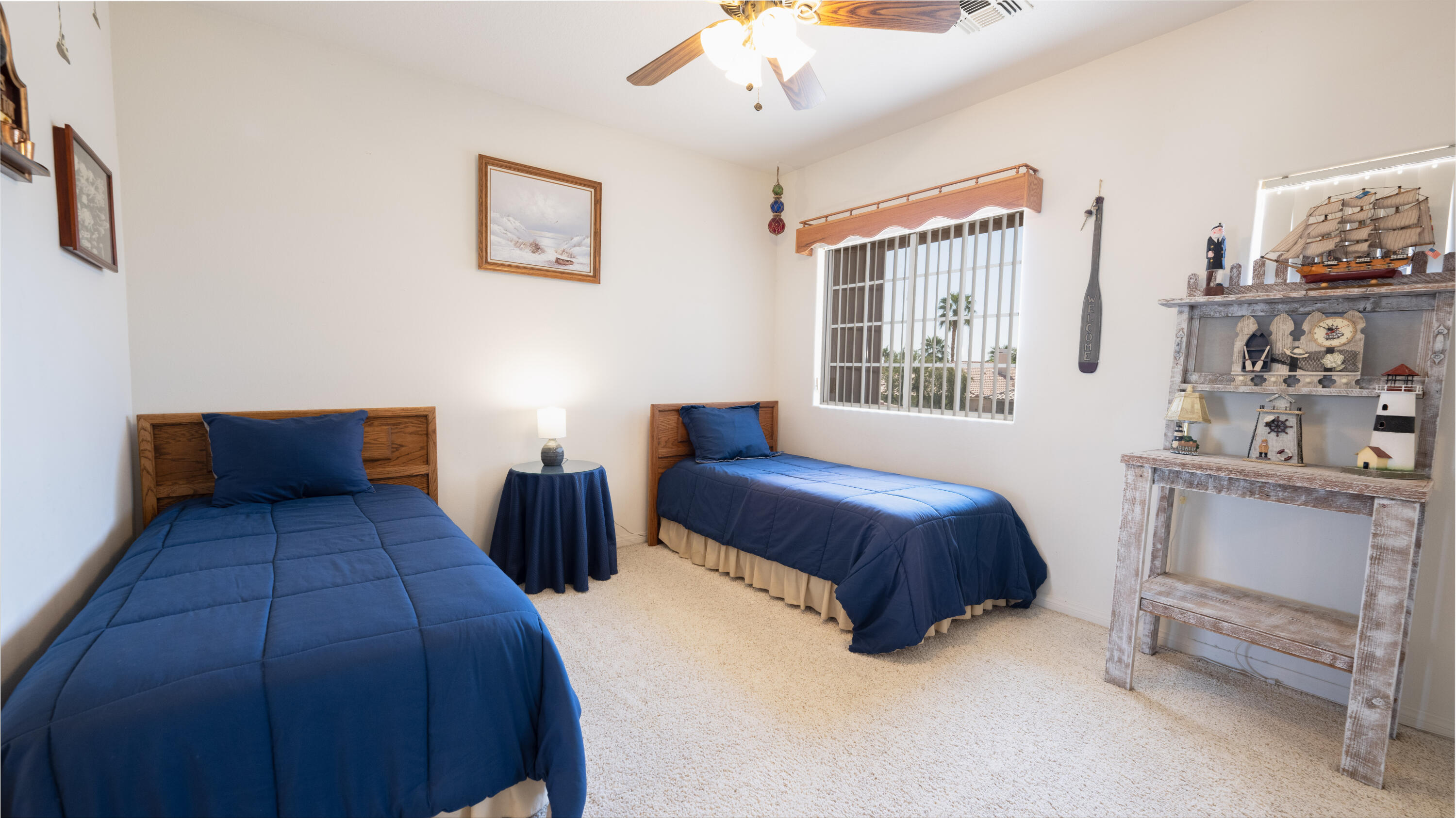 80432 Pebble Beach Drive Indio, CA 92201 - Photo 21 of 46 a bedroom with double bed and a window