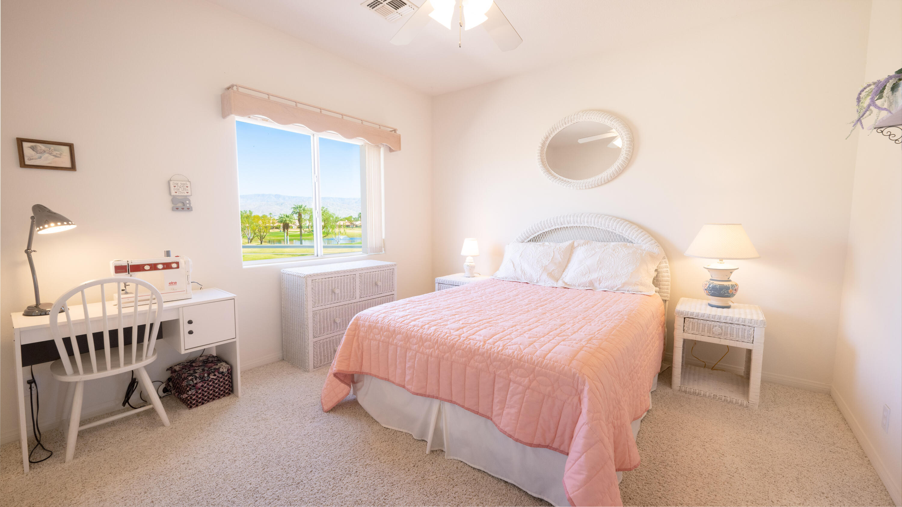 80432 Pebble Beach Drive Indio, CA 92201 - Photo 22 of 46 a bedroom with a bed and a window