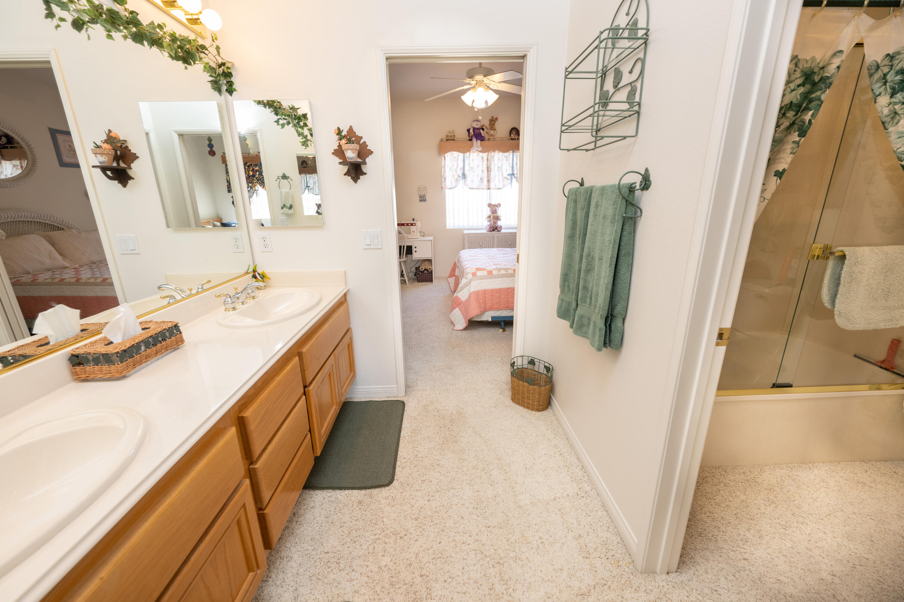 80432 Pebble Beach Drive Indio, CA 92201 - Photo 23 of 46 a bathroom with a sink and mirror