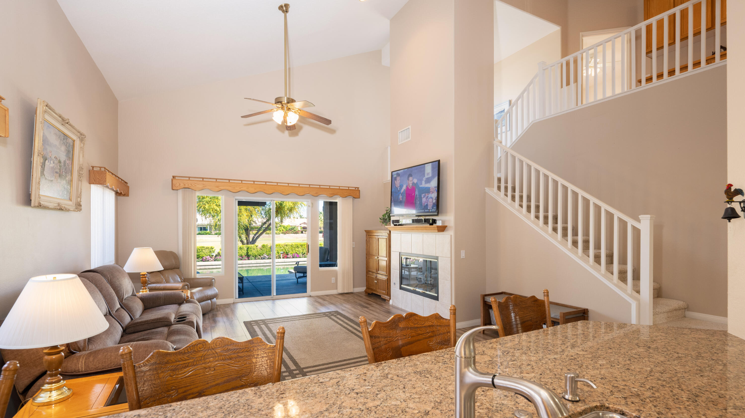 80432 Pebble Beach Drive Indio, CA 92201 - Photo 9 of 46 a living room with furniture fireplace and a window