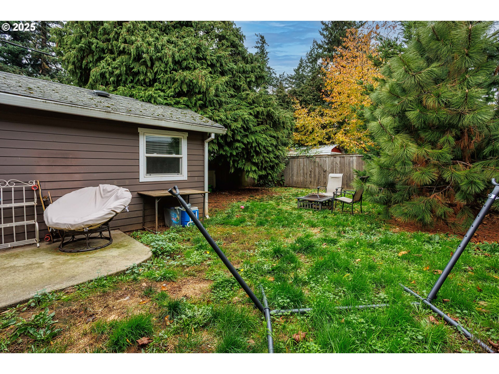 11511 Southeast Division Street Portland, OR 97266 - Photo 20 of 21 a view of backyard of a house with a patio