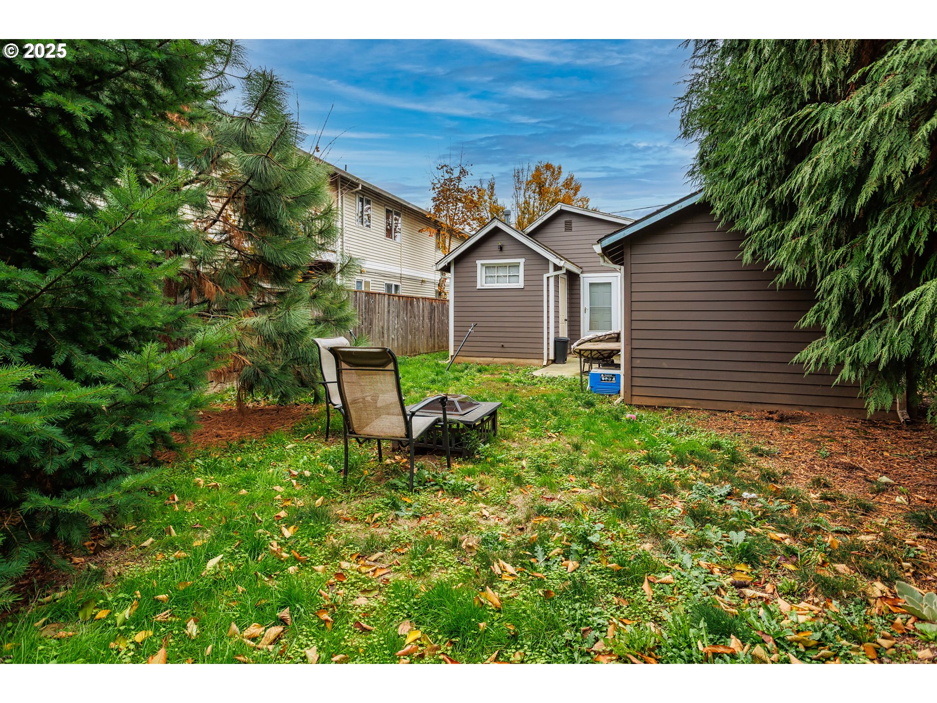 11511 Southeast Division Street Portland, OR 97266 - Photo 21 of 21 a front view of a house with a yard