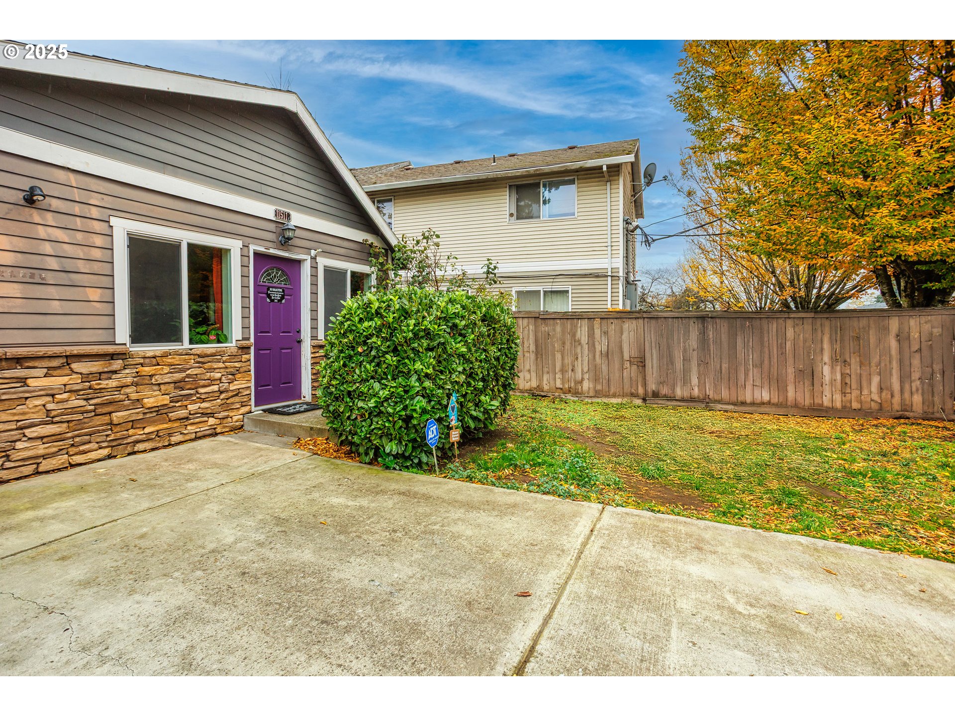 11511 Southeast Division Street Portland, OR 97266 - Photo 3 of 21 a view of a house with a garden