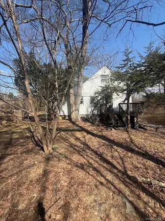 a view of a yard covered with snow in the front