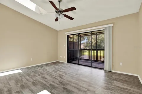 a view of a porch with wooden floor