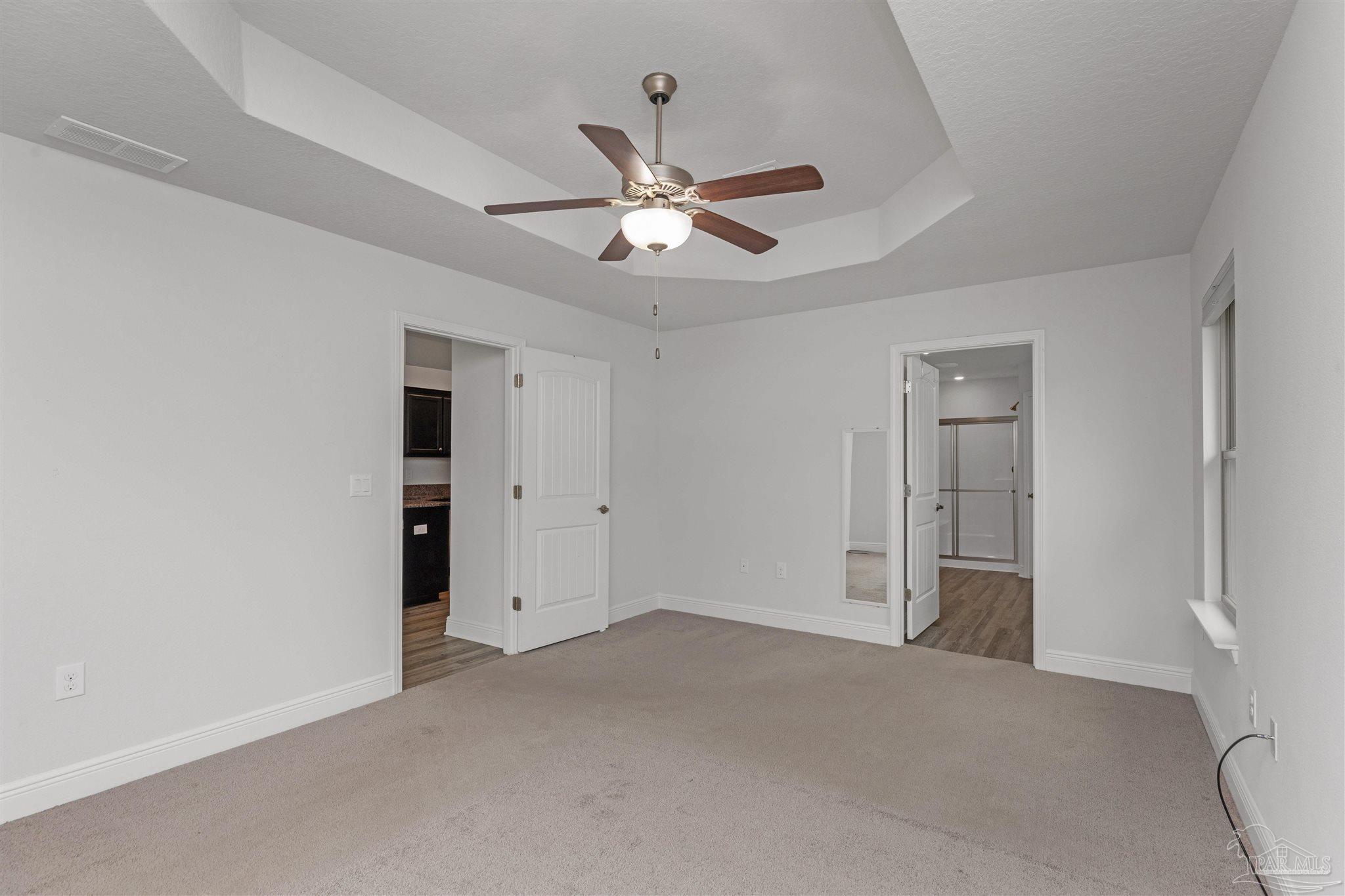 3626 Ranch Drive Crestview, FL 32539 - Photo 14 of 29 a view of an empty room with a ceiling fan
