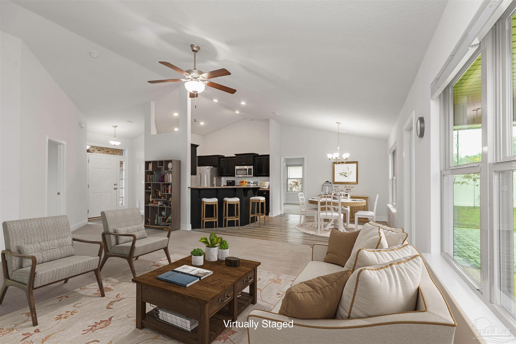 3626 Ranch Drive Crestview, FL 32539 - Photo 2 of 29 a living room with furniture kitchen view and a large window