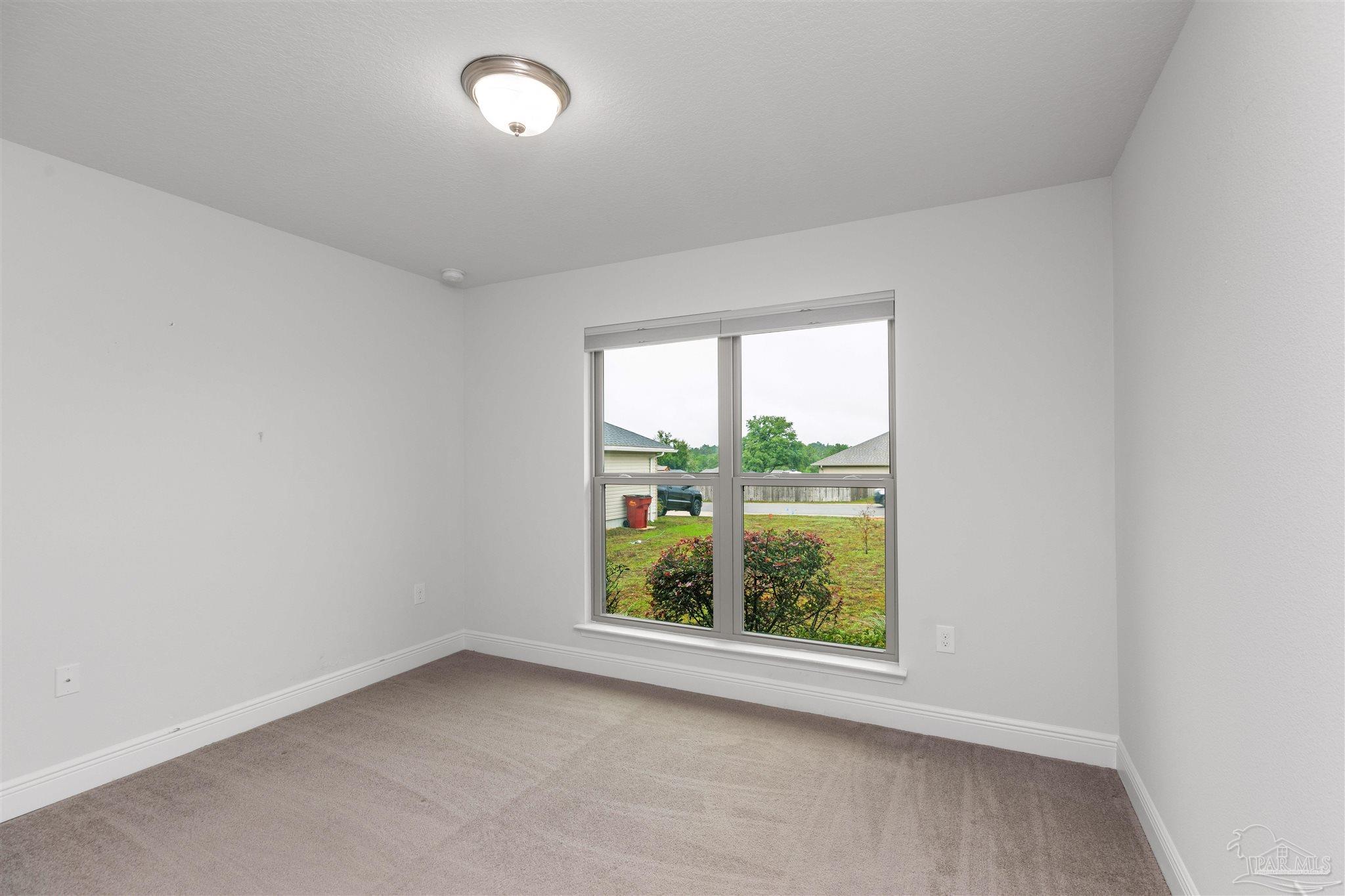 3626 Ranch Drive Crestview, FL 32539 - Photo 23 of 29 an empty room with window