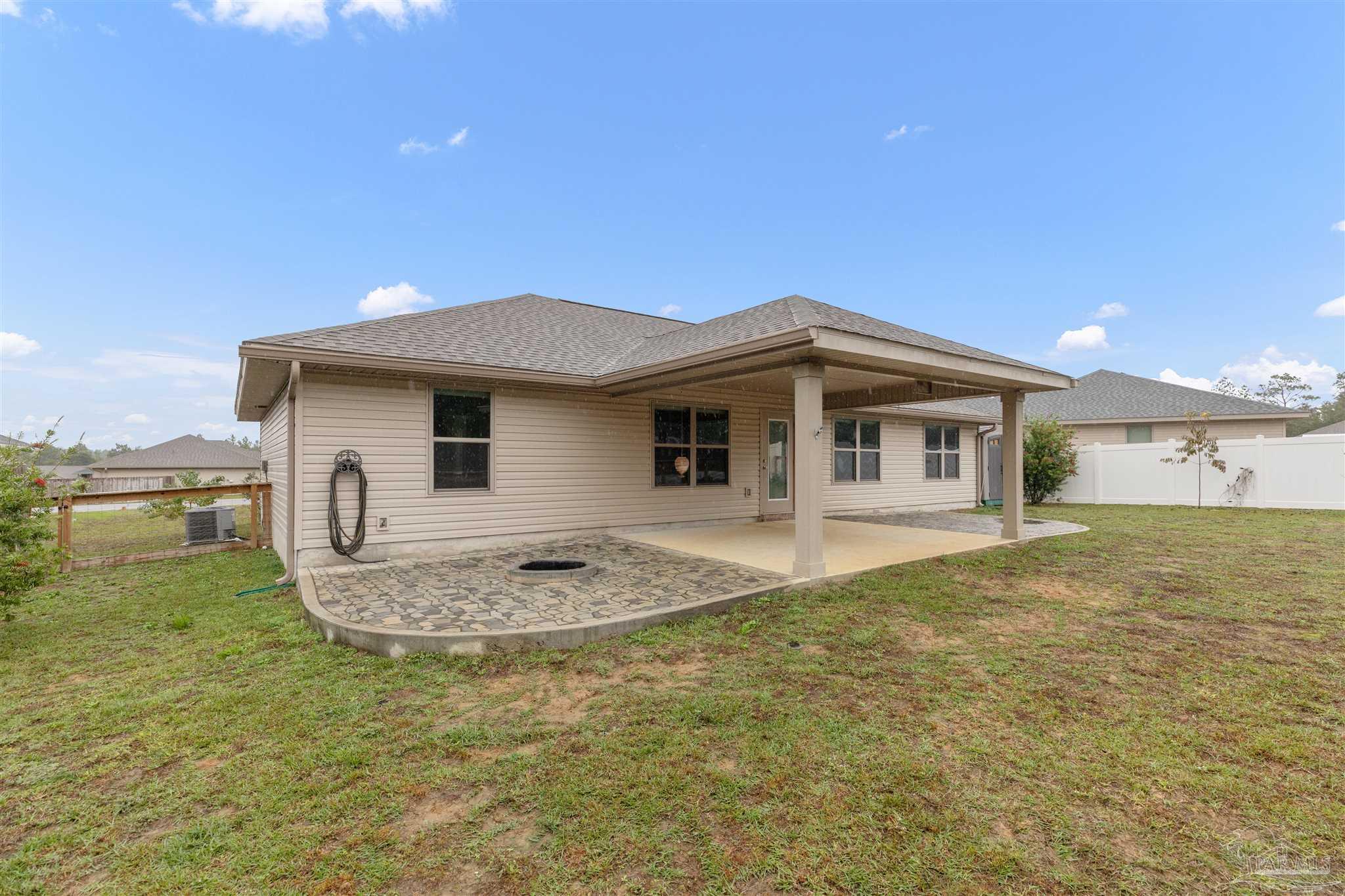 3626 Ranch Drive Crestview, FL 32539 - Photo 28 of 29 a front view of a house with a yard