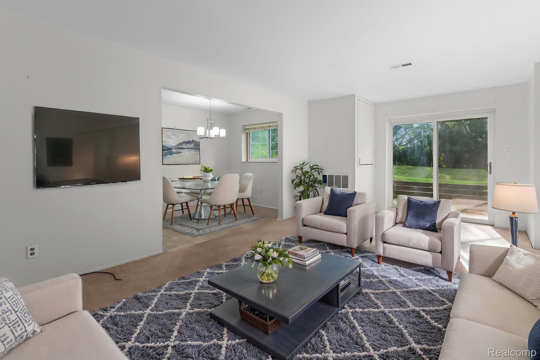 424 Baldwin Avenue, Unit 81 Rochester, MI 48307 - Photo 3 of 25 Welcome home!! Vibrant and beautiful open living space. *virtually staged