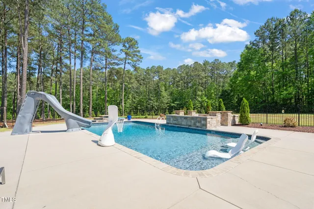 a workspace with a couch and a window