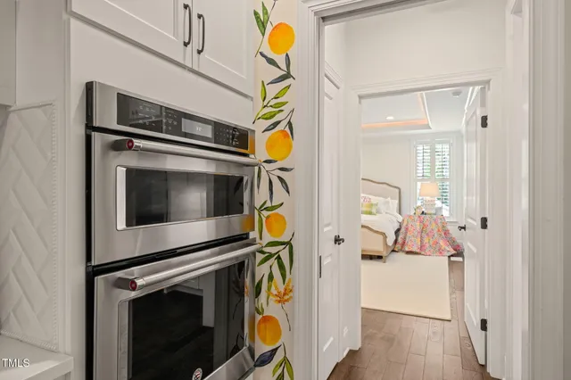 a white bath tub sitting next to a white sink