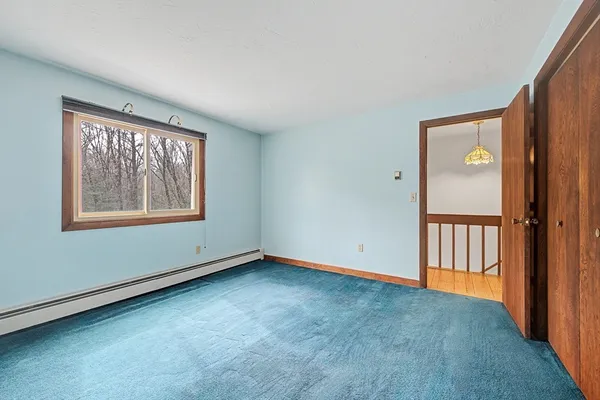 view of room with window and hardwood floor