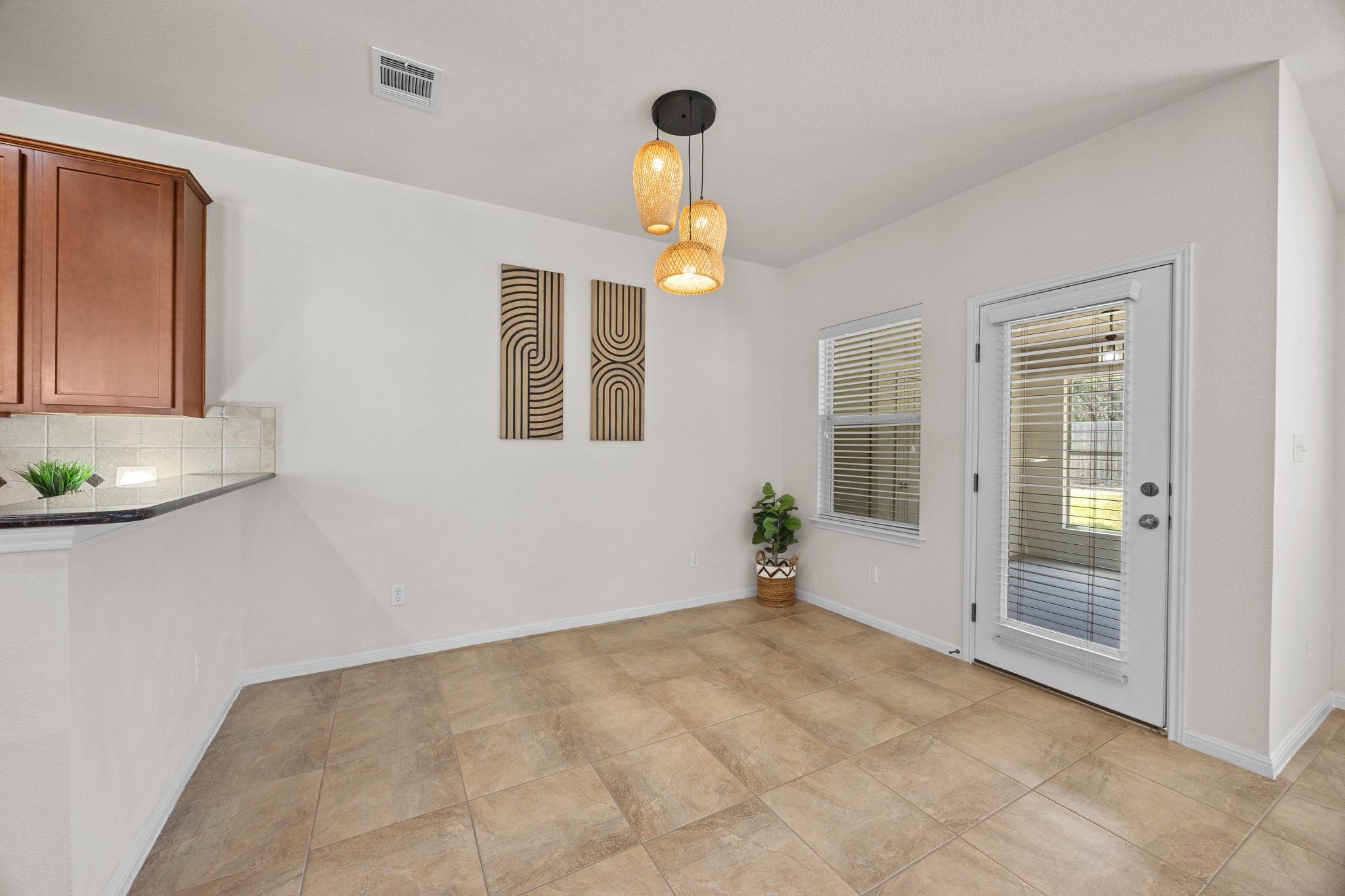 1317 Rimstone Drive Cedar Park, TX 78613 - Photo 15 of 32 Unfurnished dining area featuring baseboards