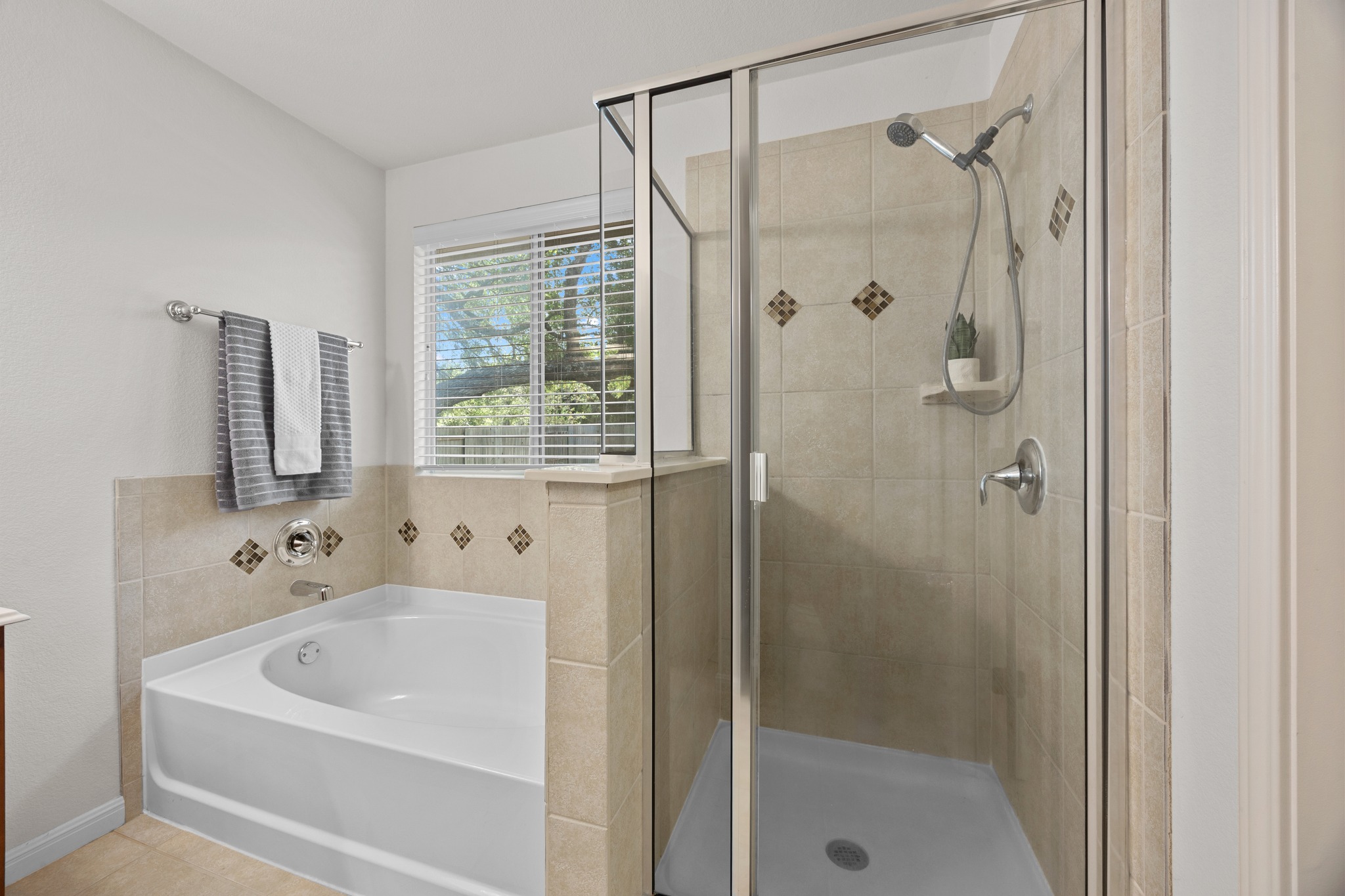 1317 Rimstone Drive Cedar Park, TX 78613 - Photo 25 of 32 Full bathroom featuring a stall shower and a bath