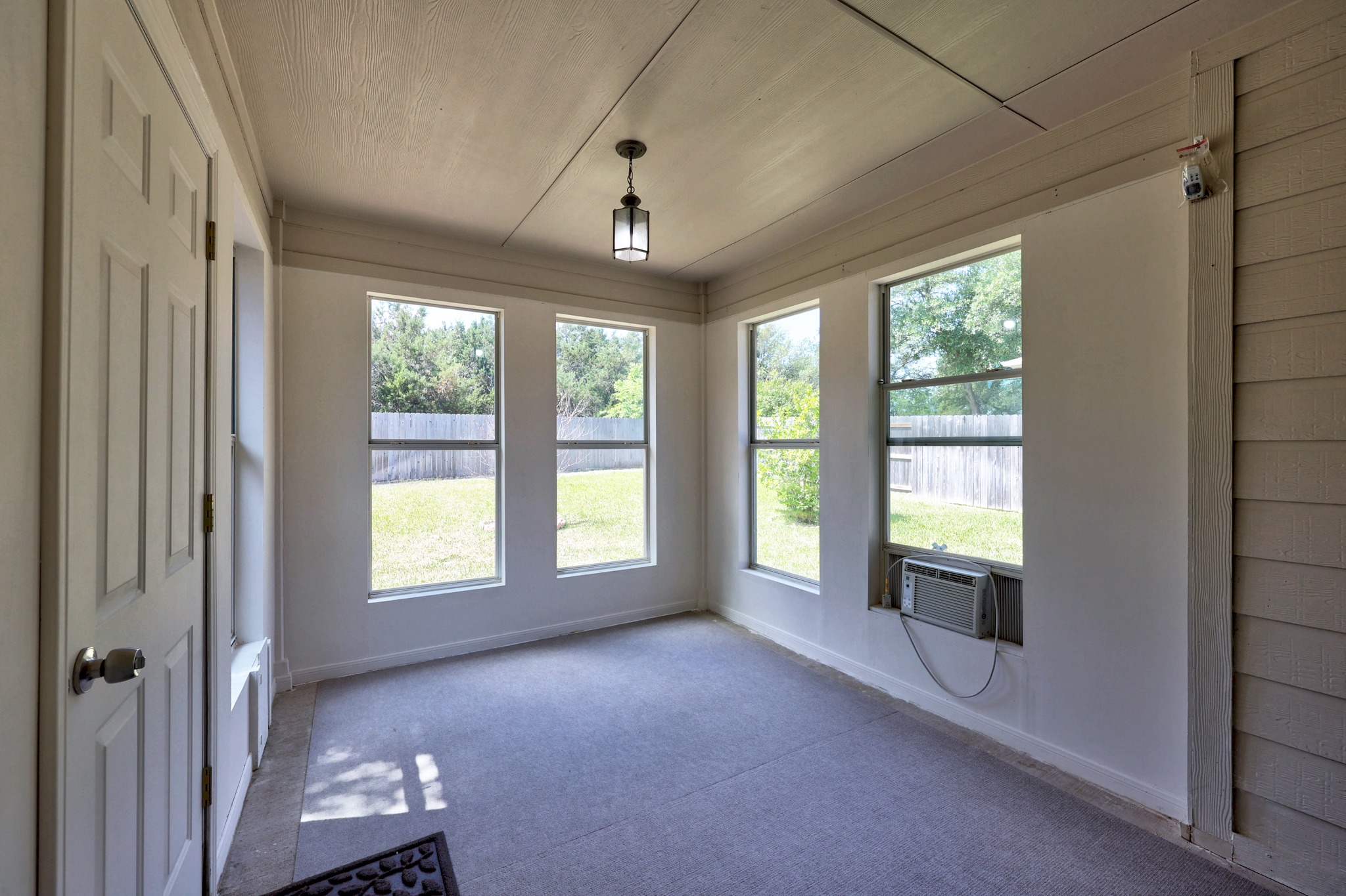 1317 Rimstone Drive Cedar Park, TX 78613 - Photo 28 of 32 Unfurnished sunroom with healthy amount of natural light and cooling unit