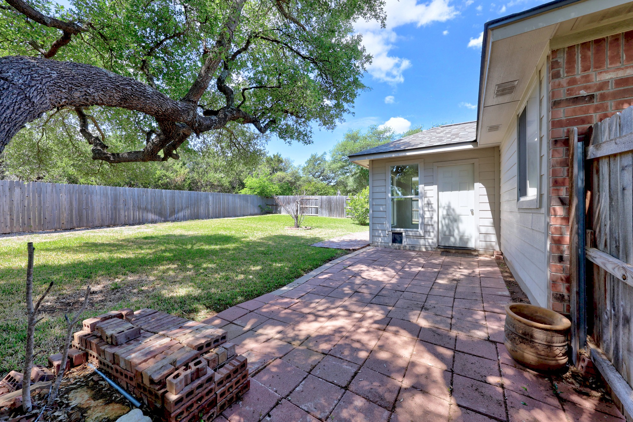 1317 Rimstone Drive Cedar Park, TX 78613 - Photo 29 of 32 Fenced backyard featuring a patio