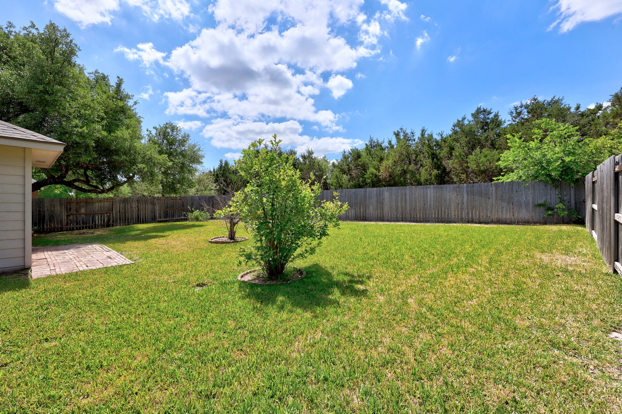 1317 Rimstone Drive Cedar Park, TX 78613 - Photo 31 of 32 Fenced backyard with a patio