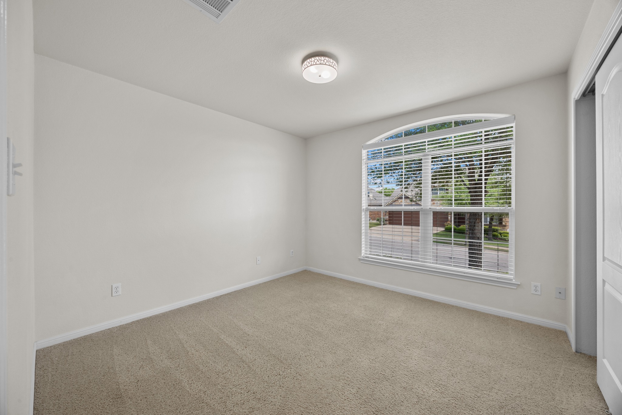 1317 Rimstone Drive Cedar Park, TX 78613 - Photo 5 of 32 Empty room featuring light colored carpet and baseboards